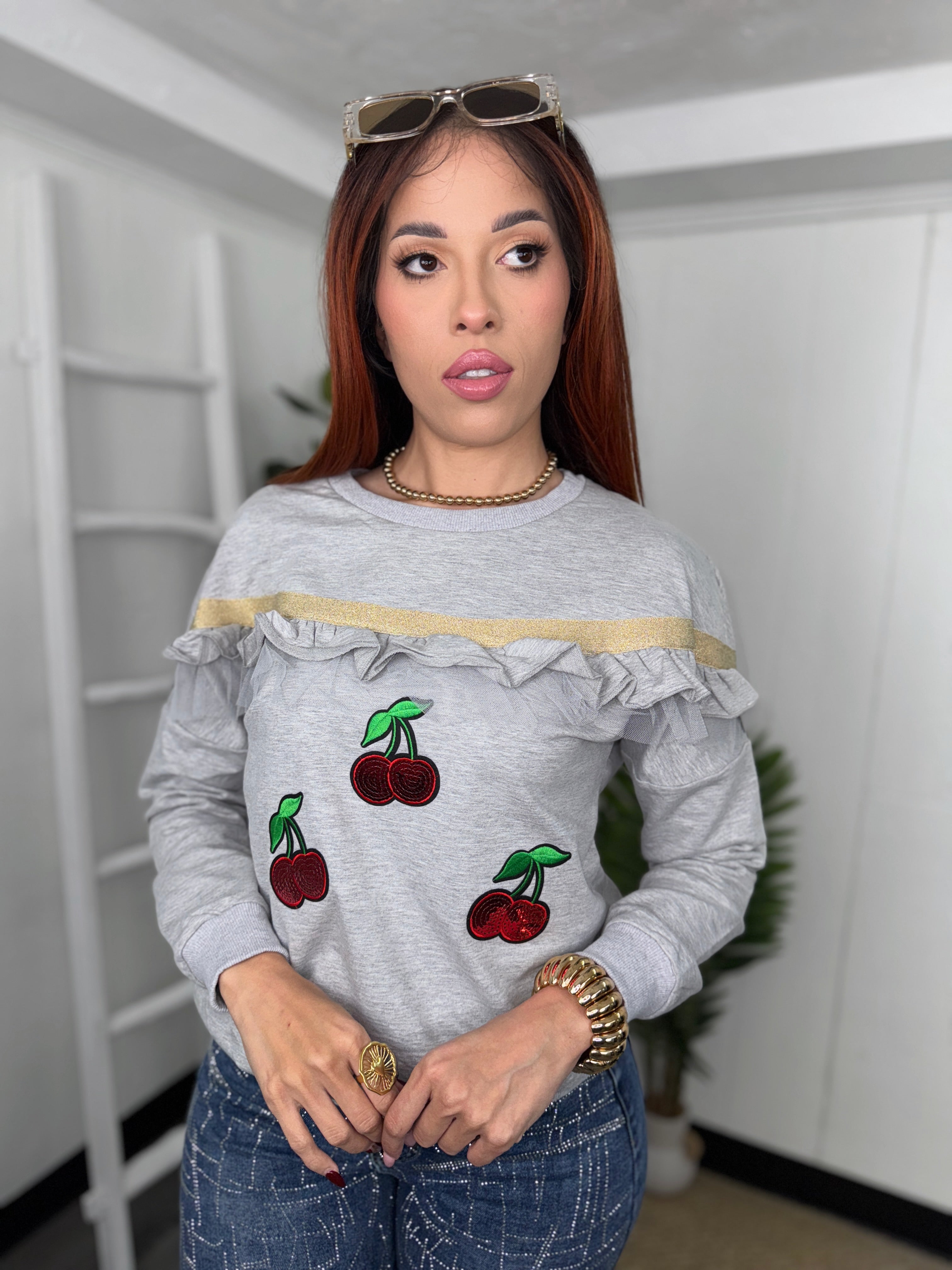 Gray sweatshirt with cherry embroidery and ruffle details for women